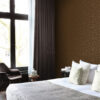 Origin Wallcoverings lillemotiiv tapeet - pruun ja hele läikiv kuld