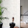 Origin Wallcoverings tapeet lubjakiviplokid pooltellises sidumises - helevalge