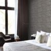 Origin Wallcoverings tapeet lubjakiviplokid pooltellises - hallikaspruun